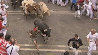 Spains San Fermin bull running festival draws thousands [upl. by Htnicayh]